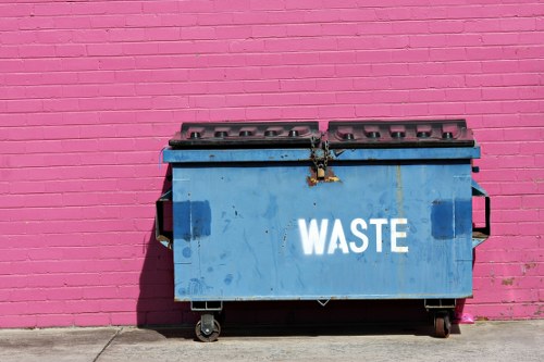 Commercial recycling bins outside a Greenwich business