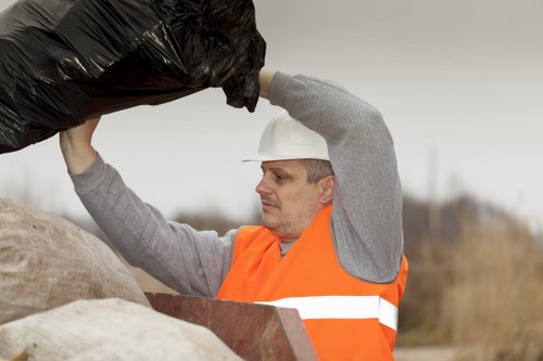 Professional waste management team handling office waste